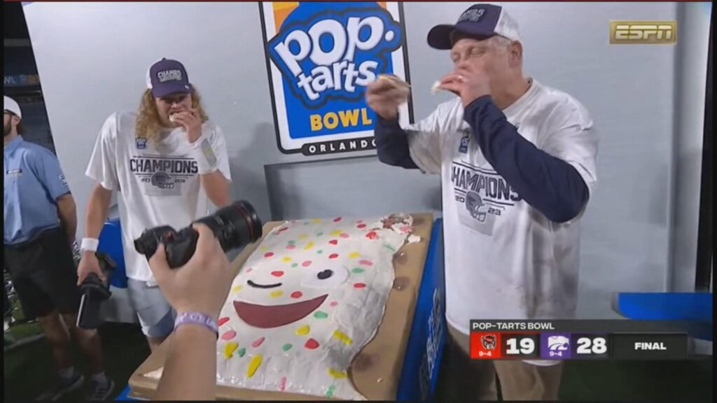 Audiences enjoying edible mascot