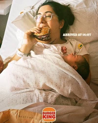 Pregnant lady having the whopper